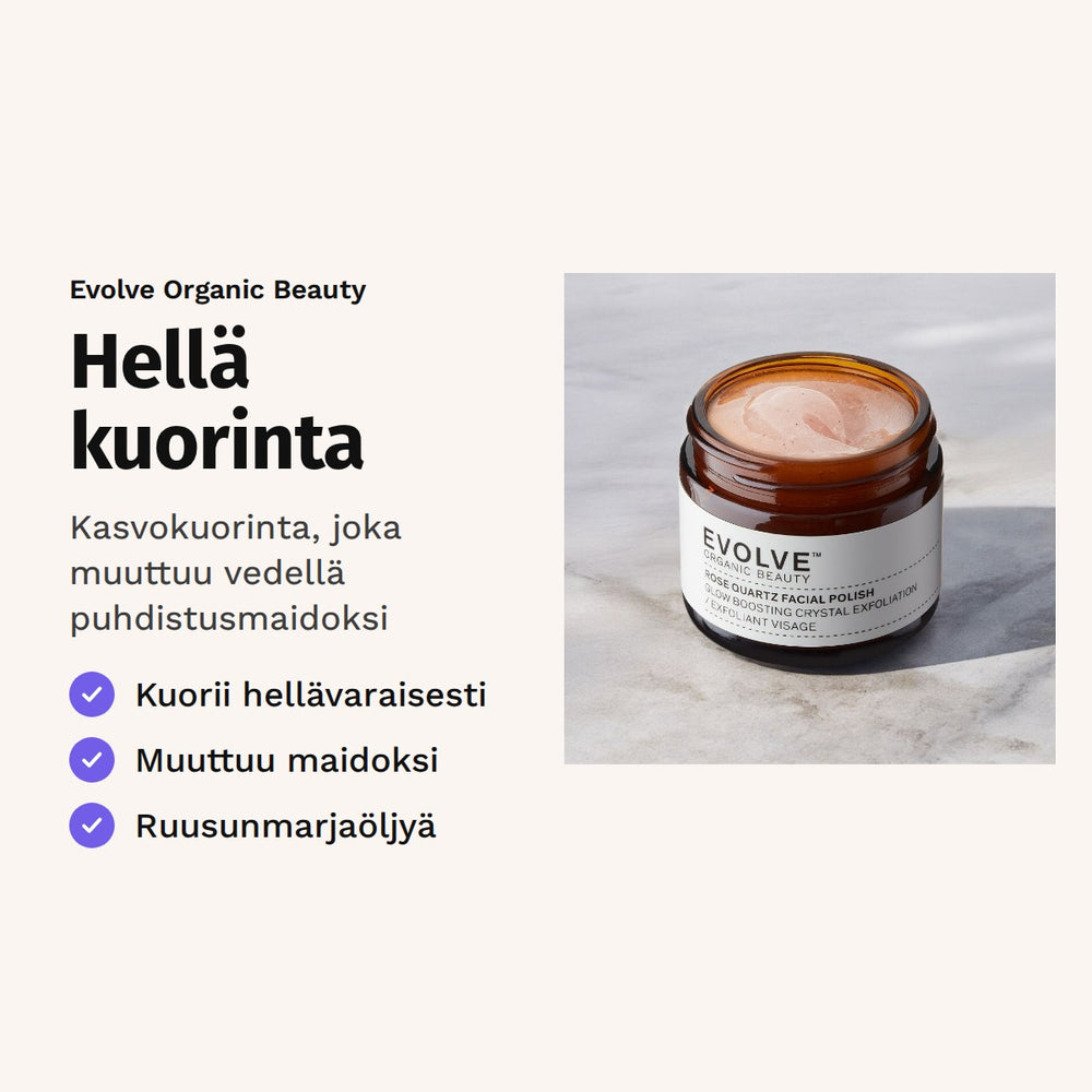 Evolve Rose Quartz Facial Polish 60 ml. Hellä kuorinta. Kasvokuorinta, joka muuttuu vedellä puhdistusmaidoksi. Kuvassa kuorintapurkki havunoksien keskellä.