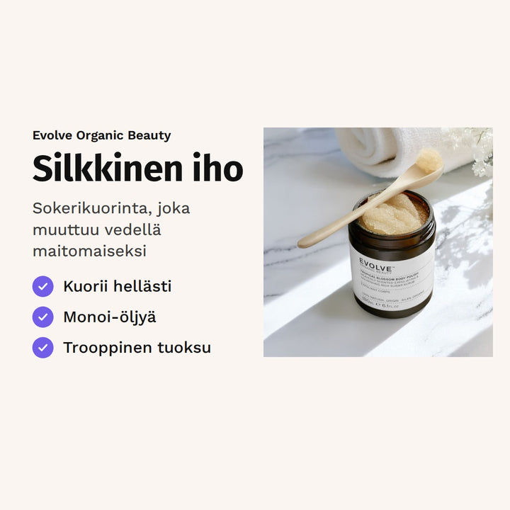 Evolve Tropical Blossom Body Polish 180 ml. Silkkinen iho. Sokerikuorinta, joka muuttuu vedellä maitomaiseksi. Kuvassa avattu kuorintapurkki.