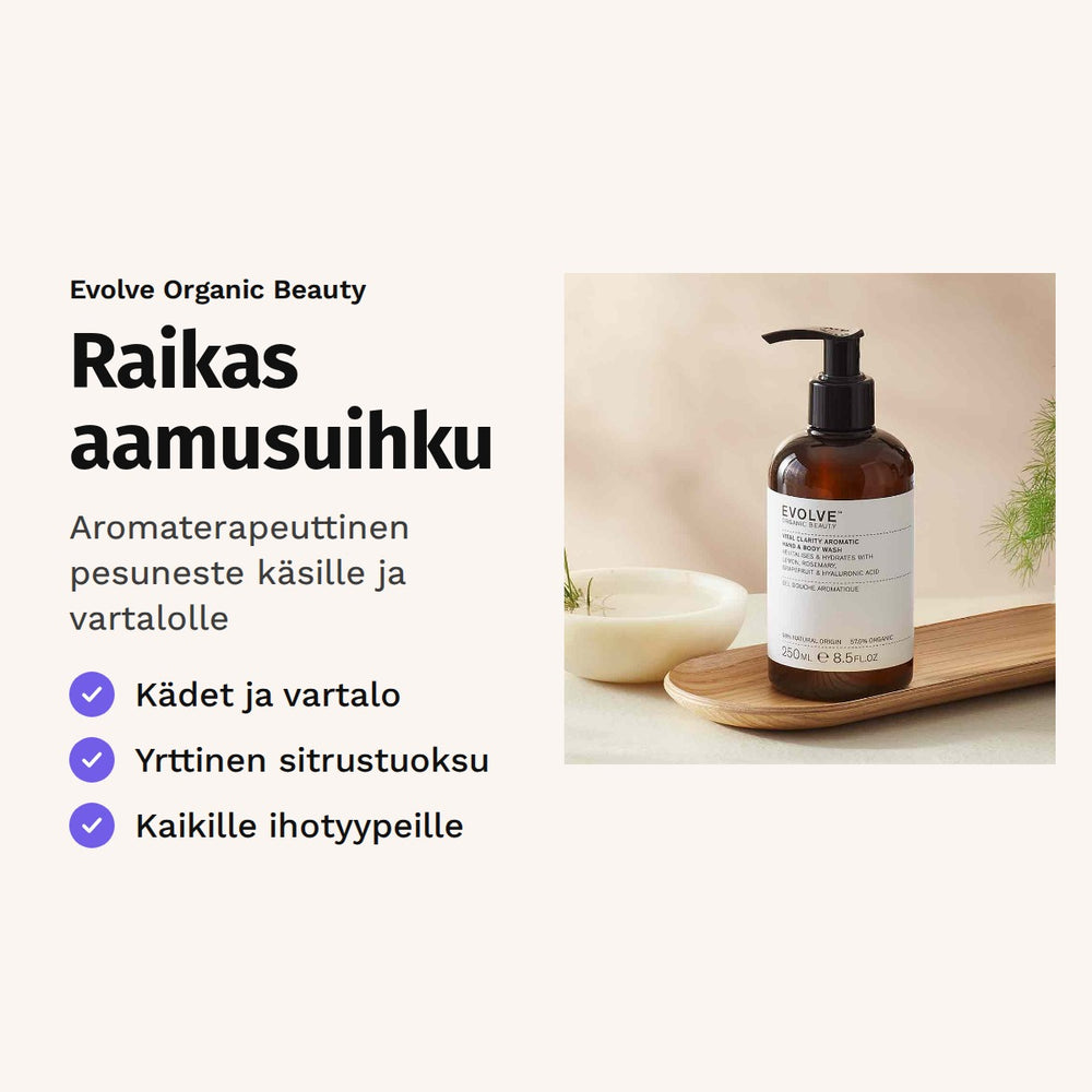 Evolve Vital Clarity Aromatic Wash 250 ml. Raikas aamusuihku. Aromaterapeuttinen pesuneste käsille ja vartalolle. Kuvassa pumppupullo puutarjottimella.