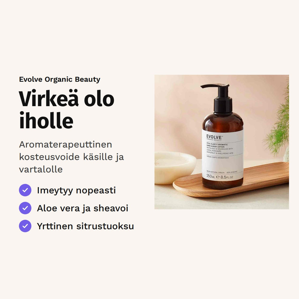 Evolve Vital Clarity Hand & Body Lotion 250 ml. Virkeä olo iholle. Aromaterapeuttinen kosteusvoide käsille ja vartalolle. Kuvassa pumppupullo puutarjottimella.