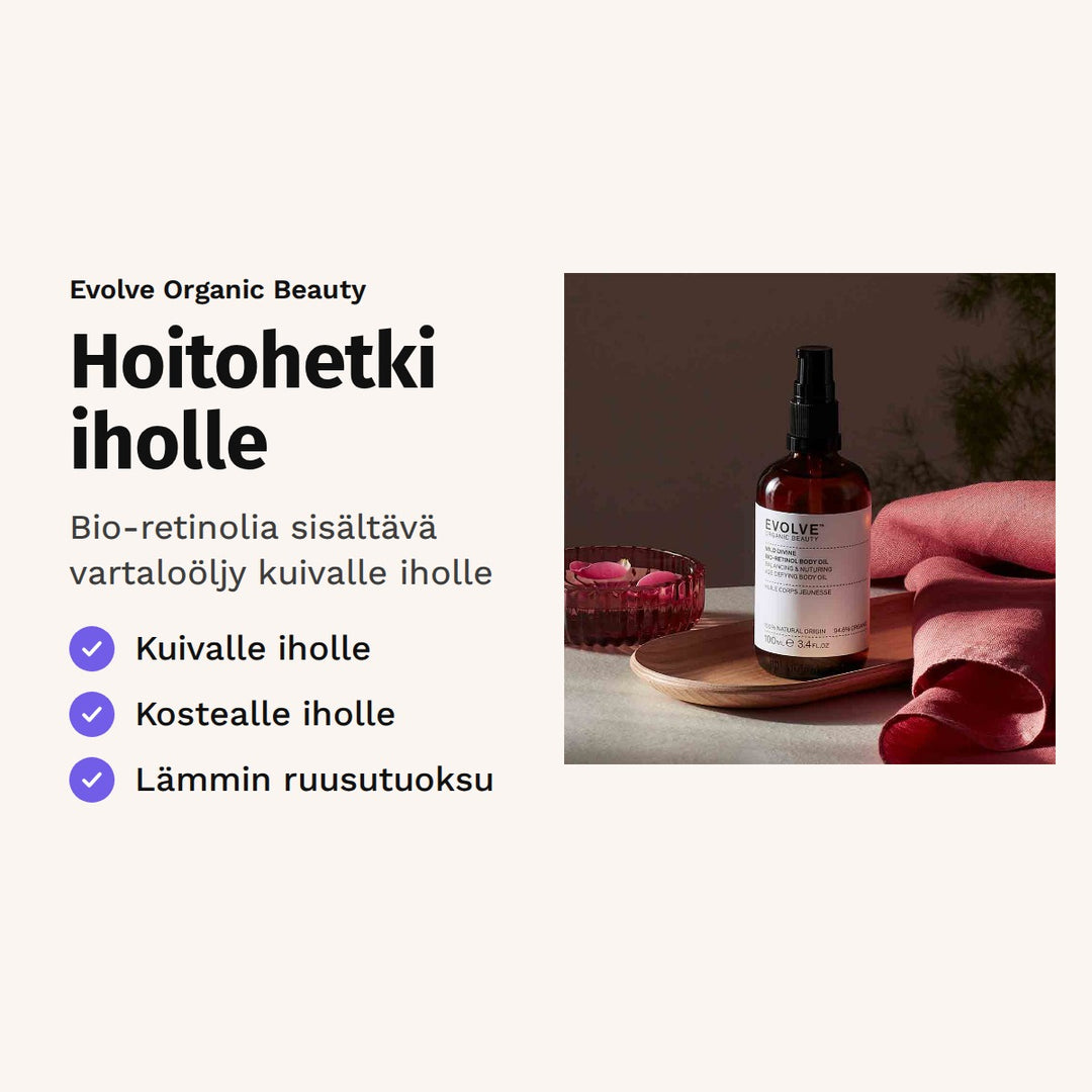 Evolve Wild Divine Body Oil 100 ml. Hoitohetki iholle. Bio-retinolia sisältävä vartaloöljy kuivalle iholle. Kuvassa öljypullo ja ruusun terälehtiä.